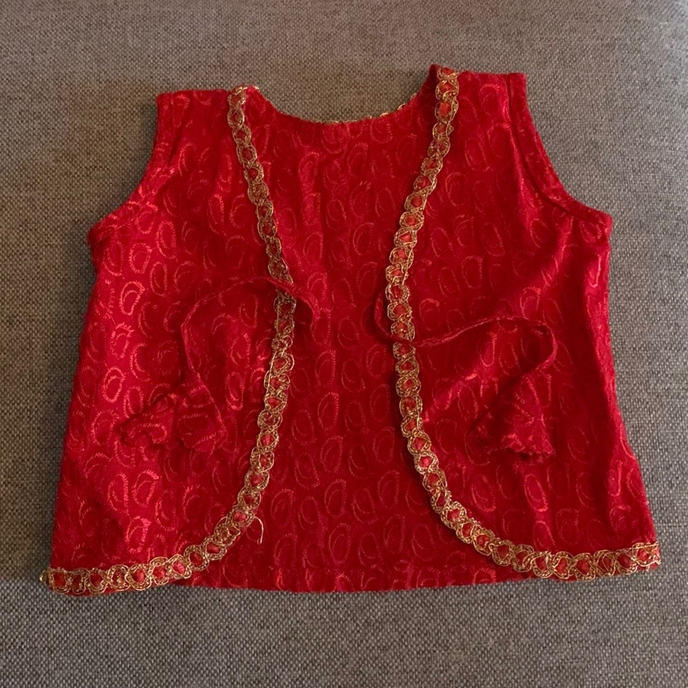 Handmade red vest with gold trim